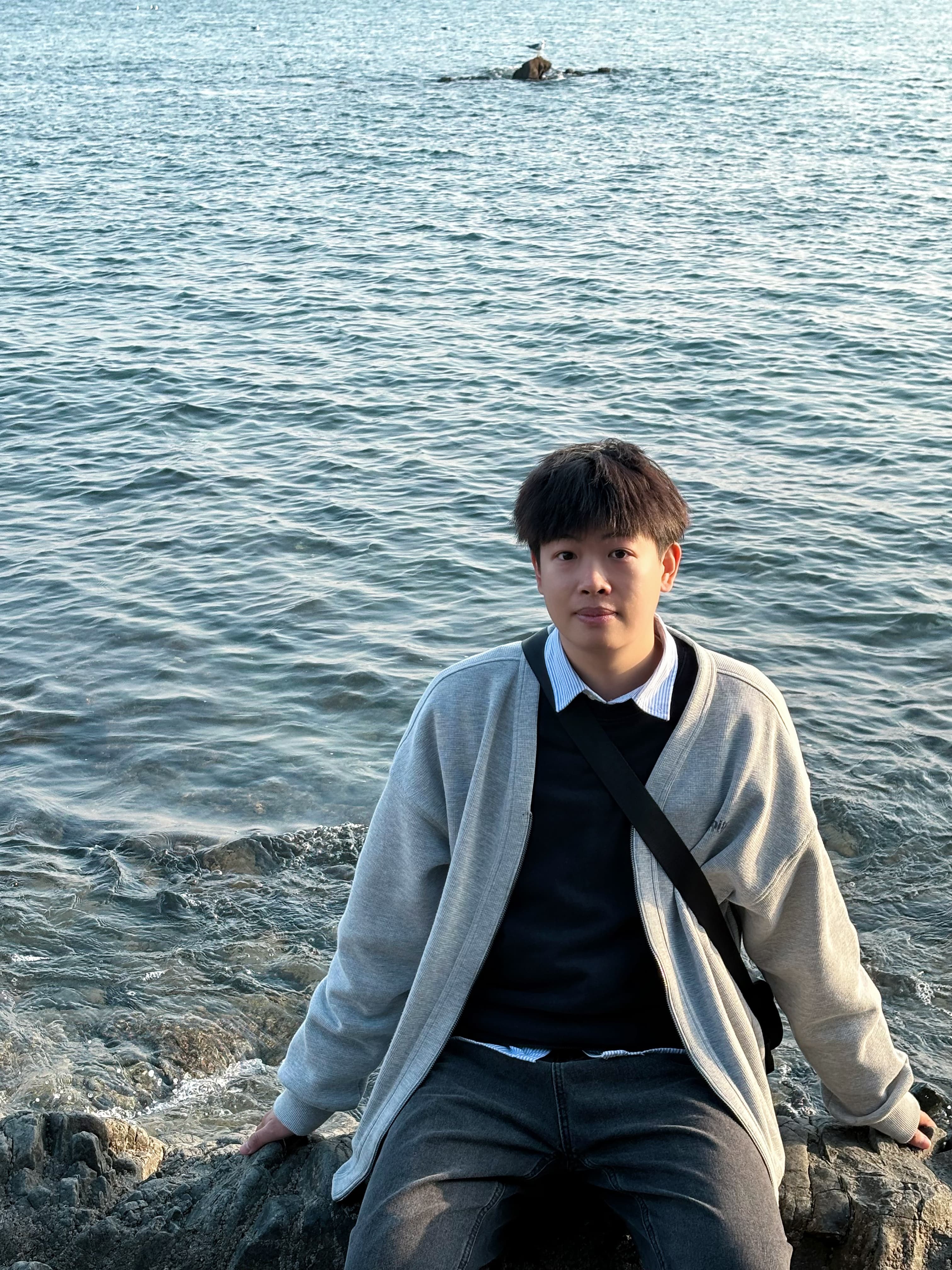 Howard standing beside the sea